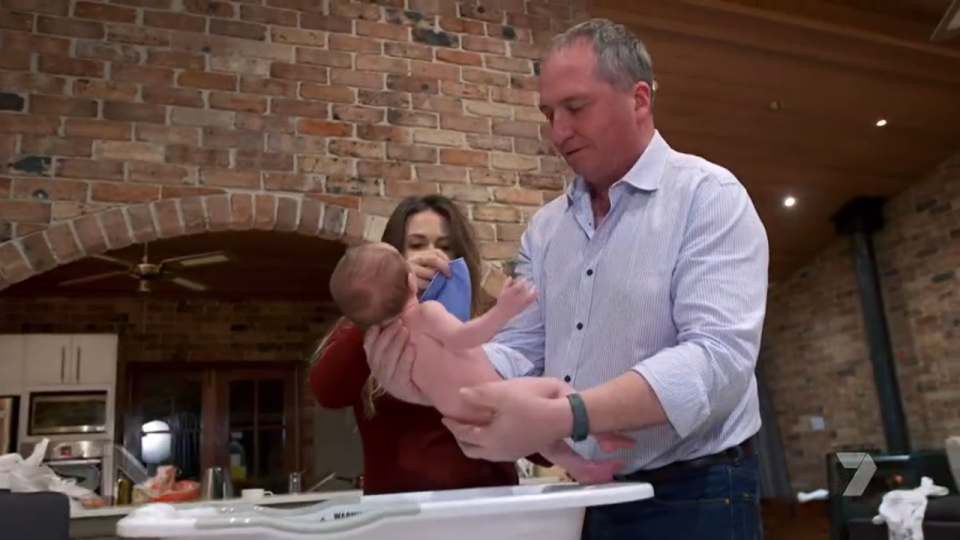 Mr Joyce was seen bathing the seven-week-old baby. Photo: Seven/Sunday Night