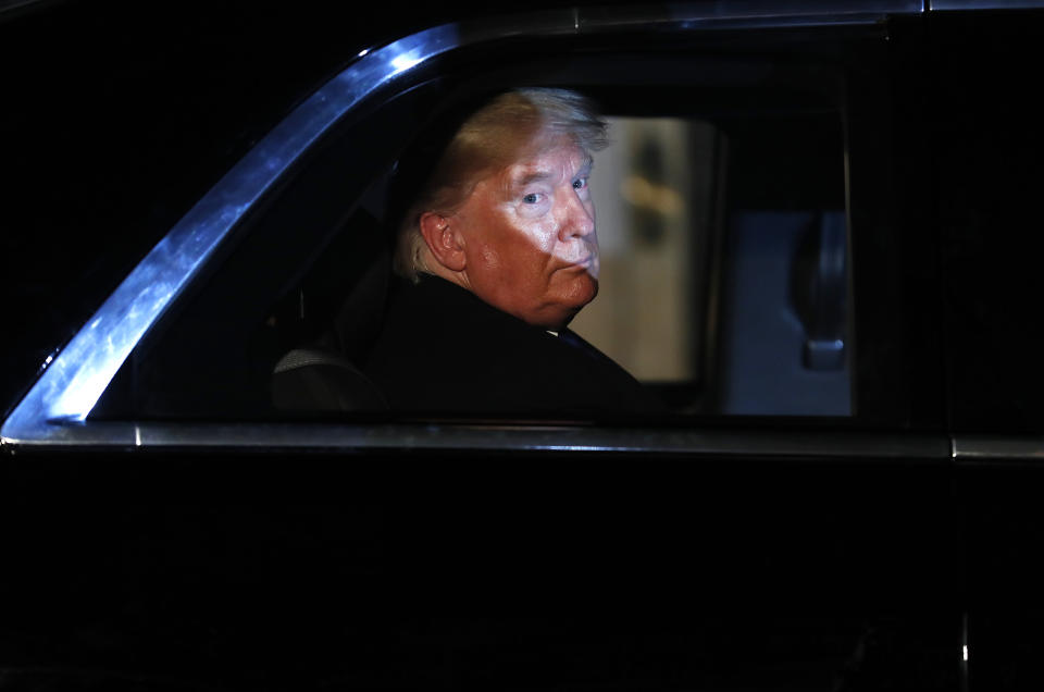 U.S. President Donald Trump leaves 10 Downing Street in London after attending a NATO reception hosted by British Prime Minister Boris Johnson, Tuesday, Dec. 3, 2019. U.S. President Donald Trump and his NATO counterparts were gathering in London Tuesday to mark the alliance's 70th birthday amid deep tensions as spats between leaders expose a lack of unity that risks undermining military organization's credibility. (AP Photo/Alastair Grant, Pool)