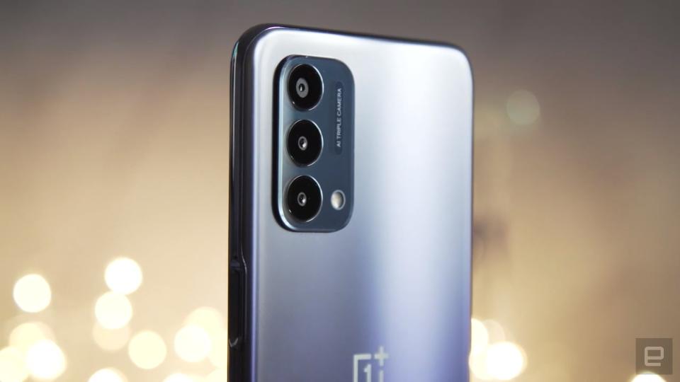 <p>OnePlus Nord N200 5G review picture. A closeup shot of the three cameras on the phone's rear with fairy lights in the background.</p> 