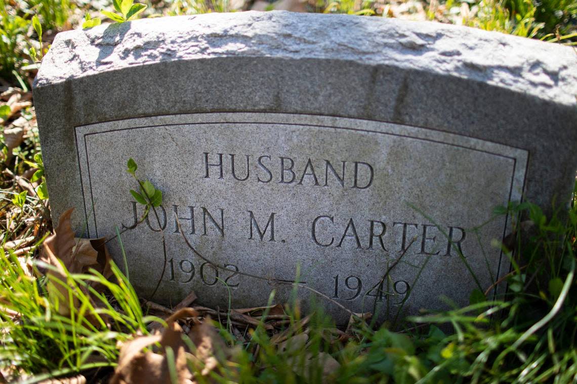 There are only a couple of graves remaining in the cemetery behind the Rosenwald School in Cadentown, one of 20 historic Black hamlets that were settled by Black people in Fayette County, Lexington, Ky., Friday, March 31, 2022. There are efforts to save the Rosenwald School and to mark and celebrate Fayette County’s Black hamlets. Julius Rosenwald built 158 schools for Black students in Kentucky between 1917 and 1932.