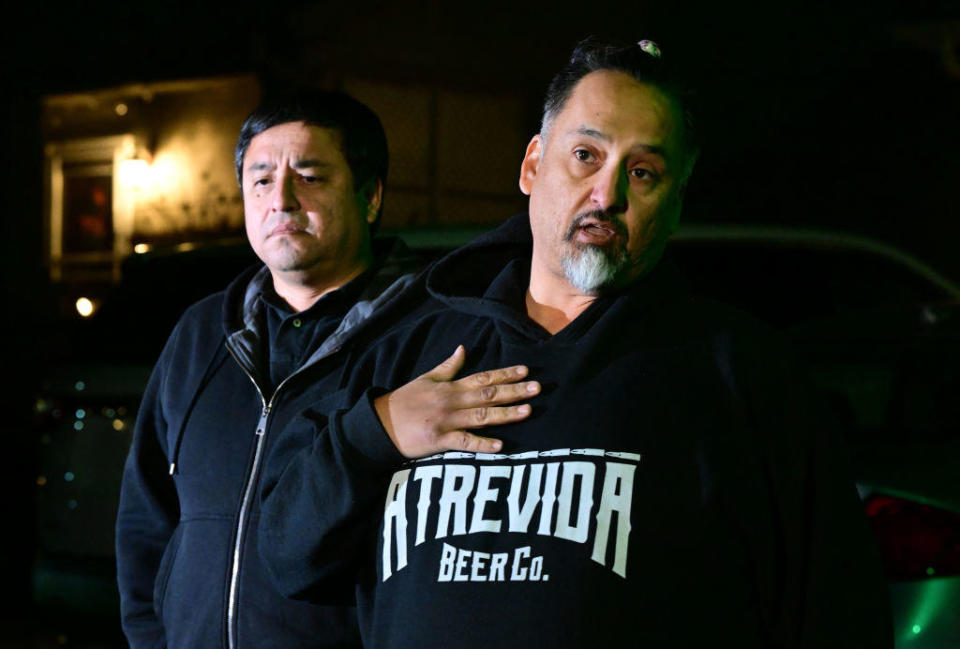 Richard  Fierro, with his brother Ed by his side, speaks outside of his home on November 21, 2022 in Colorado Springs, Colorado. Fierro is credited with saving many lives when he helped subdue the man suspected of opening fire and killing five inside a LGBTQ+ nightclub. / Credit: Helen H. Richardson/MediaNews Group/The Denver Post via Getty Images