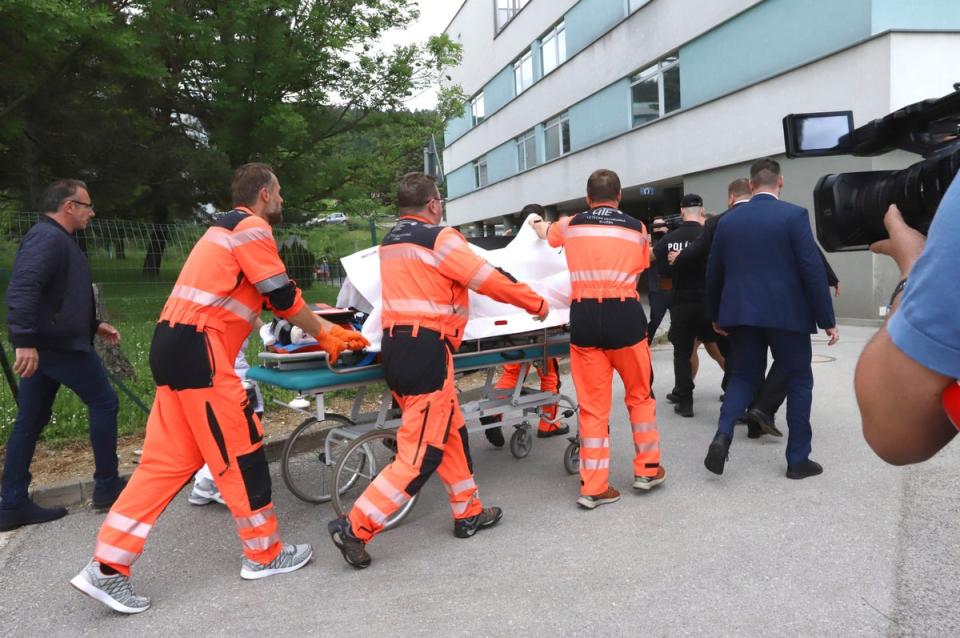 Fico is wheeled into hospital in Banska Bystrica after being wounded in a shooting in Handlova (AP)