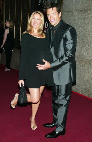 <p>Jim Spellman/WireImage</p> Harry Connick Jr. and wife Jill Goodacre in 2002