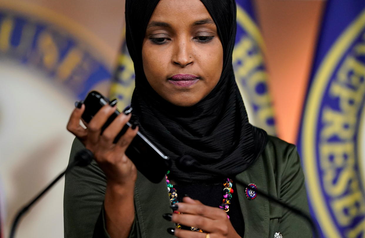 Rep. Ilhan Omar, D-Minn., plays a voicemail containing an anti-Muslim message from an unknown person, which she says she recently received, during a Nov. 30 news conference addressing comments made by Rep. Lauren Boebert, R-Colo., on Capitol Hill.