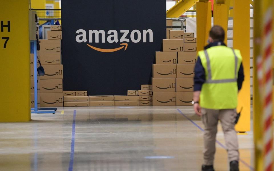 Amazon will close three warehouses in Britain - SEBASTIEN BOZON/AFP via Getty Images