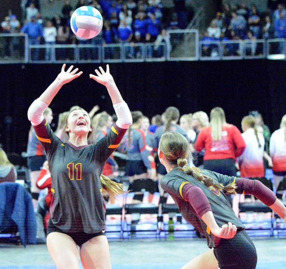 Harrisburg's Kayleigh Hybertson (11) set the ball for teammate Karalynn Leach during a Class AA semifinal match against Sioux Falls O'Gorman in the state high school volleyball tournament on Friday, Nov. 18, 2022 in the Denny Sanford PREMIER Center.