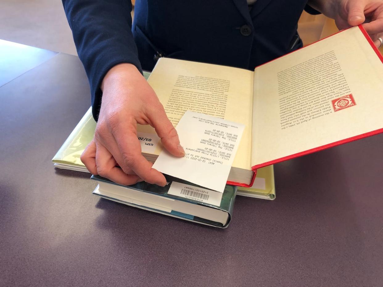 The Ottawa Public Library had a busy year with the most popular book titles coming from a wide array of genres, from memoirs and romance to thrillers. (Angela Gemmill/CBC - image credit)