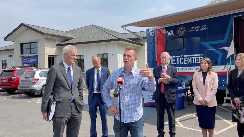 Representative Jared Golden, a Democrat elected in Maine's rural and conservative second congressional district, speaks to reporters and veterans in Rumford, Maine