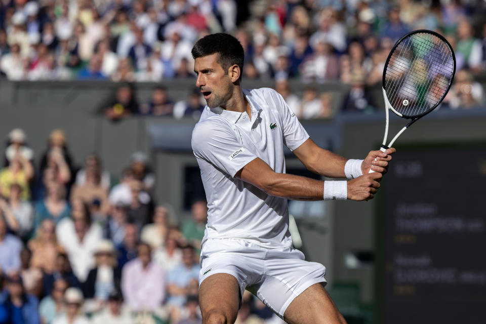 LONDON, ENGLAND - JULY 5.   Novak Djokovic of Serbia in action against Jordan Thompson of Australia in the Gentlemen's Singles second-round match on Centre Court during the Wimbledon Lawn Tennis Championships at the All England Lawn Tennis and Croquet Club at Wimbledon on July 05, 2023, in London, England. (Photo by Tim Clayton/Corbis via Getty Images)