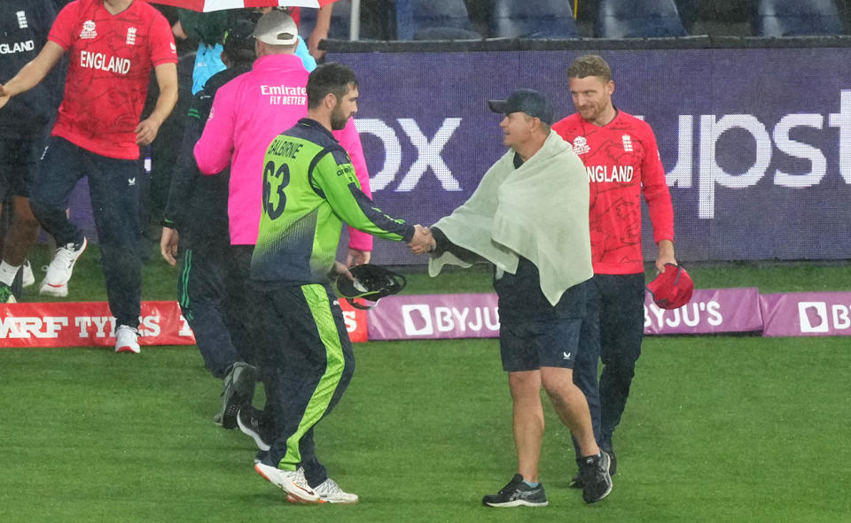 Andrew Balbirnie, pictured here shaking hands with England coach Matthew Mott and captain Jos Buttler.