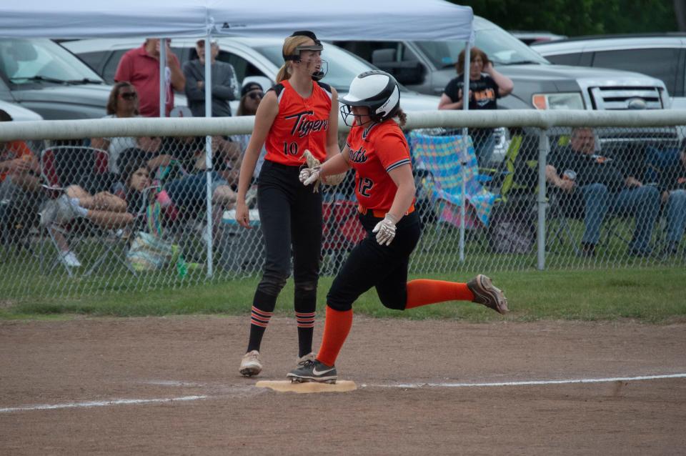 Jonesville's Bre Thacker rounds third base on her way to scoring a run.