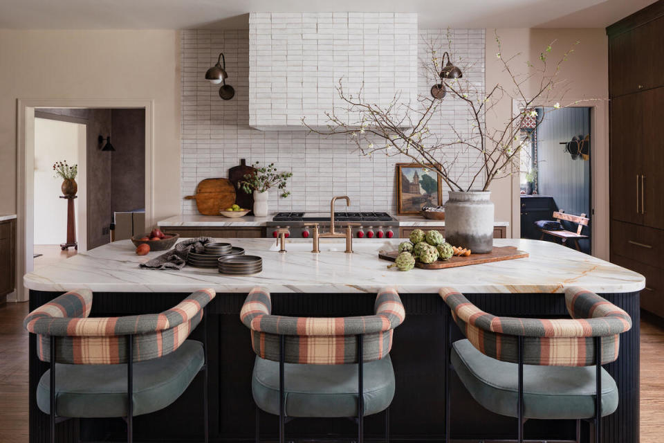 A cheerful stripe enlivens a trio of kitchen counter stools