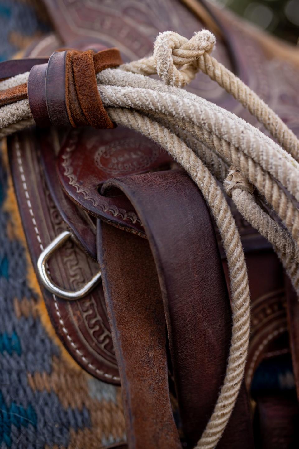 A rope is fixed to Jake Harvath’s saddle as loads his horses in preparation to begin a yearlong horse ride across the country at Sage Creek Equestrian in Charleston, Wasatch County, on Monday, Sept. 25, 2023. | Spenser Heaps, Deseret News