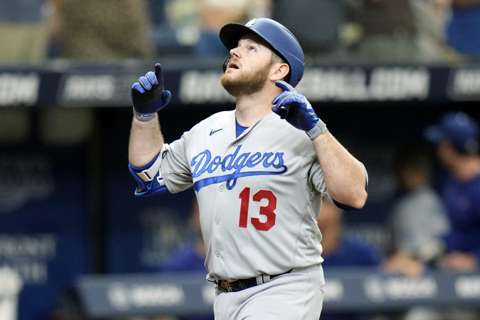 Los Angeles Dodgers' Max Muncy reacts after his solo home run off Tampa Bay Rays relief pitcher Josh Fleming during the second inning of a baseball game Sunday, May 28, 2023, in St. Petersburg, Fla. (AP Photo/Chris O'Meara)