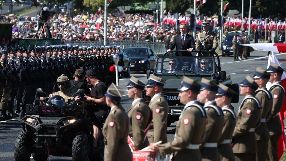 Polish President Andrzej Duda arrives for the military parade in Warsaw on Armed Forces Day on August 15. - Kacper Pempel/Reuters