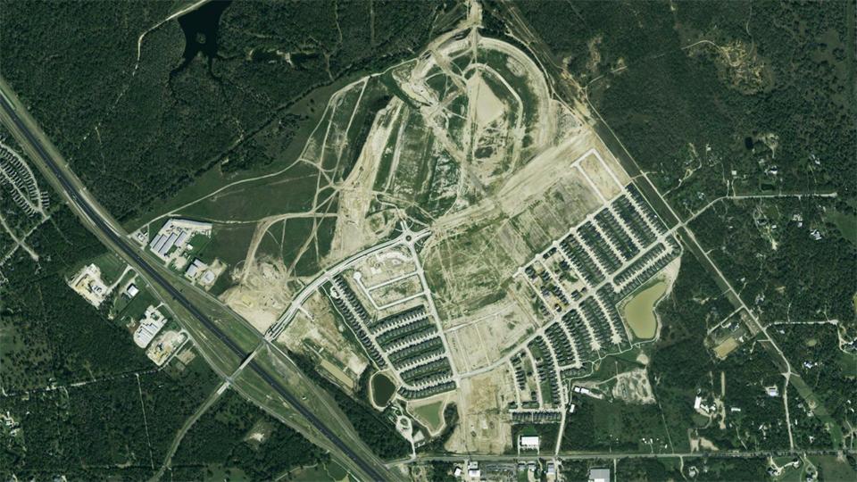 Seeing Texas World Speedway Being Devoured by Housing Development Is Real Sad photo