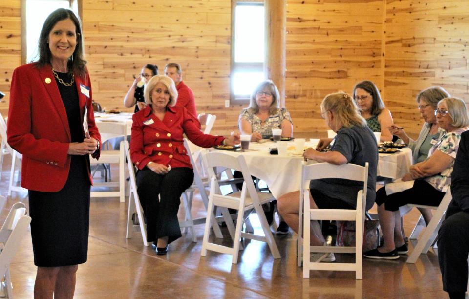 Rep. Tracy Richardson, R-Marysville, standing, speaks to a group of Marion County anti-abortion advocates during a pro-Issue 1 rally held Thursday, July 13, 2023, at The Barn at All Occasions in Waldo. Marion Citizens for Life hosted the event, which included speakers from Issue 1 advocates Protect Women Ohio and Ohio Right to Life.