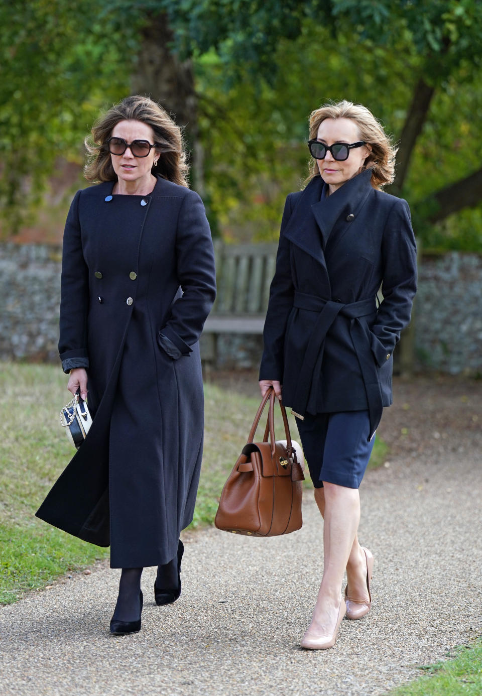 Susanna Reid (left) and Sian Williams arrive for the funeral of TV presenter and journalist Bill Turnbull (Joe Giddens/PA)