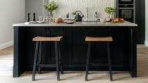 <p> Dark, dramatic, and utterly unforgettable, black can prove a surprisingly flexible color for kitchen cabinets, which perhaps explains its enduring appeal. This year, black is taking a more sophisticated turn, which is less about overpowering and more about subtlety. We’re talking elegant black and white monochrome schemes, and delicate off-blacks paired with warm neutrals.  </p> <p> Black can undoubtedly be a dominating color, a point that is often cited as the main deterrent to embracing black in the kitchen. “Don’t be dissuaded from using black, as with any other color, it comes in many shades and variations and there’s something for everyone,” advises interior designer Benji Lewis.  </p> <p> Start by narrowing down the basic look you are seeking – subtle or strong ­– then decide on the most appropriate black. “For example, Little Greene’s Lamp Black is a very good soft black, while Zoffany’s Vine Black offers greater intensity,” says Benji. “If going for black is something you like the idea of, but you’d rather knock a deep jeweled hint into things, look for a black with just a touch of green or blue, such as Sanderson’s Night Fishing.” </p>