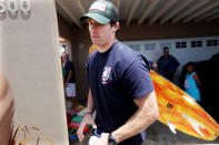 OCEANSIDE, CA - MAY 6: New Orleans Saints Quarterback Drew Brees walks out after a "paddle out" in honor of NFL star Junior Seau on May 6, 2012 in Oceanside, California. Seau, who played for various NFL teams including the San Diego Chargers, Miami Dolphins and New England Patriots was found dead in his home on May 2nd of an apparent suicide. Family members have decided to donate his brain for research on links between concussions and possible depression. (Photo by Sandy Huffaker/Getty Images)