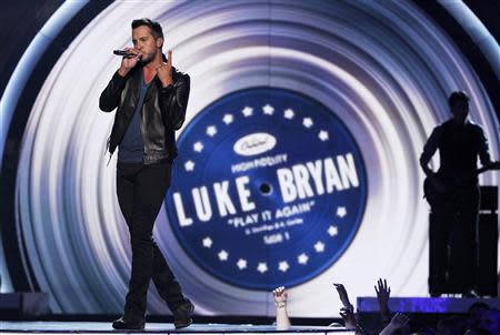 Luke Bryan performs "Play it Again" on stage at the 49th Annual Academy of Country Music Awards in Las Vegas, Nevada April 6, 2014. REUTERS/ Robert Galbriath