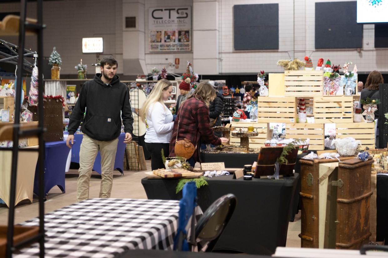 Vendor booths set up in the holiday market during the Winter Wanderland event at Kellogg Arena on Friday, Dec. 2, 2022.