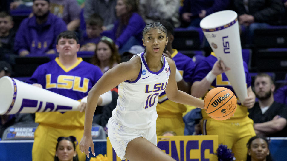LSU forward Angel Reese dribbles during a first round game in the women's NCAA tournament in Baton Rouge, Louisiana, on March 17, 2023. (AP Photo/Matthew Hinton)