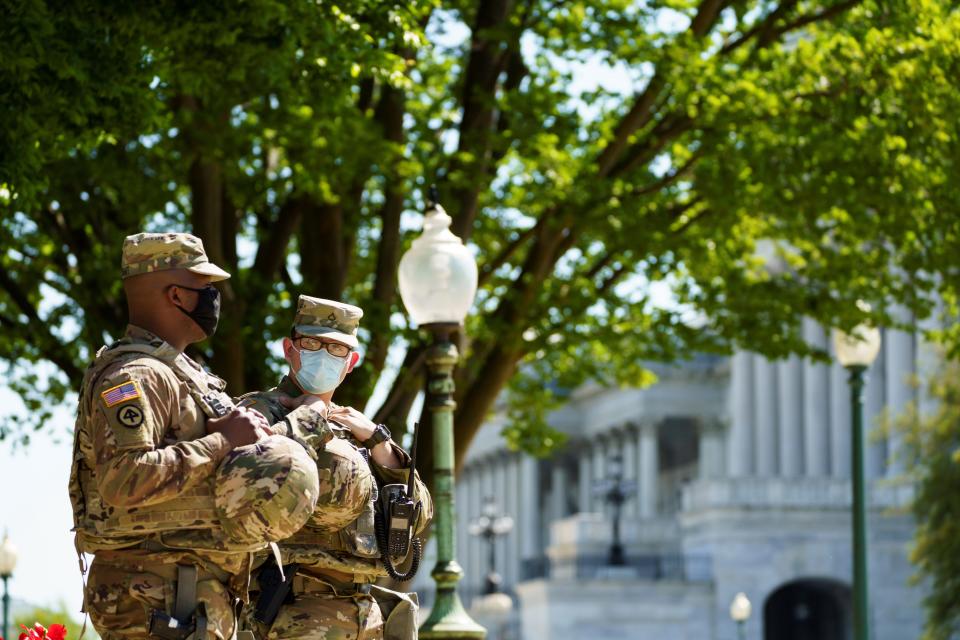 WASHINGTON, April 20, 2021 -- U.S. National Guard members stand guard near the U.S. Capitol in Washington, D.C., the United States, on April 20, 2021. Former Minneapolis police officer Derek Chauvin was found guilty of two counts of murder and one count of manslaughter over the death of George Floyd, the judge presiding over the high-profile trial announced Tuesday, reading the jury's verdict. The District of Columbia National Guard activated approximately 250 personnel in response to potential demonstrations related to the Derek Chauvin trial. (Photo by Ting Shen/Xinhua via Getty) (Xinhua/Ting Shen via Getty Images)