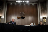 Chairman Lindsey Graham, R-S.C., speaks as Sen. Dianne Feinstein, D-Calif., listens at right, during a Senate Judiciary Committee business meeting to consider authorization for subpoenas relating to the Crossfire Hurricane investigation, and other matters on Capitol Hill in Washington, Thursday, June 11, 2020. (Erin Schaff/The New York Times via AP, Pool)
