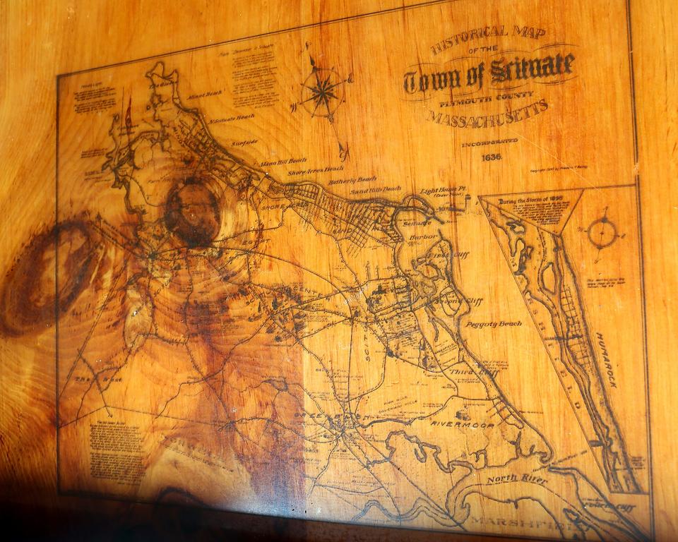 A map of Scituate is etched into one of the tables at the Mill Wharf.
