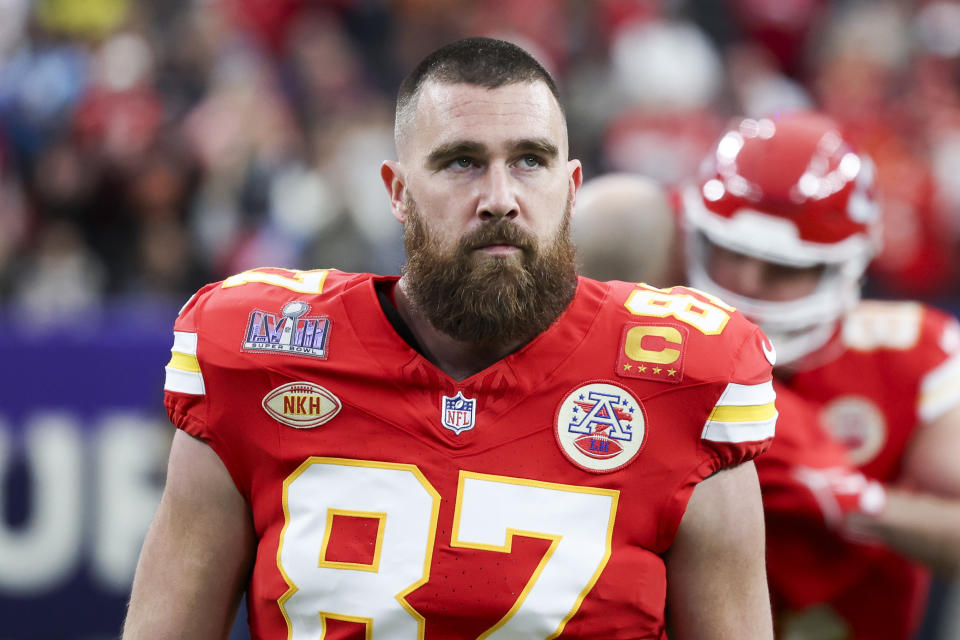 Travis Kelce in football uniform focused on field