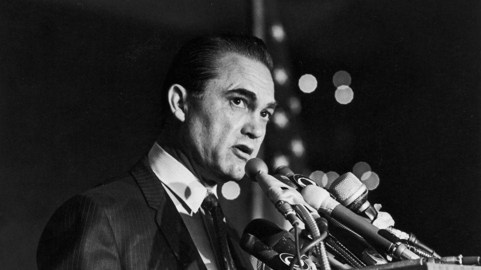 Alabama Gov. George Wallace makes a speech at a fundraising dinner held at the American Hotel in New York City in October 1968. - Hulton Archive/Getty Images