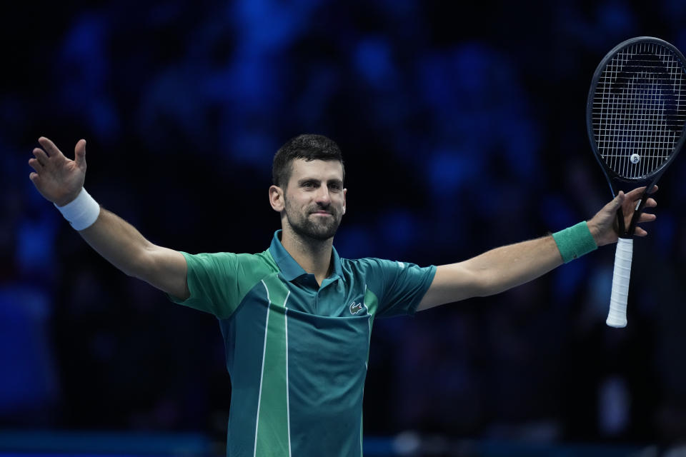 Serbia's Novak Djokovic celebrates after winning the singles final tennis match of the ATP World Tour Finals at the Pala Alpitour, in Turin, Italy, Sunday, Nov. 19, 2023. (AP Photo/Antonio Calanni)