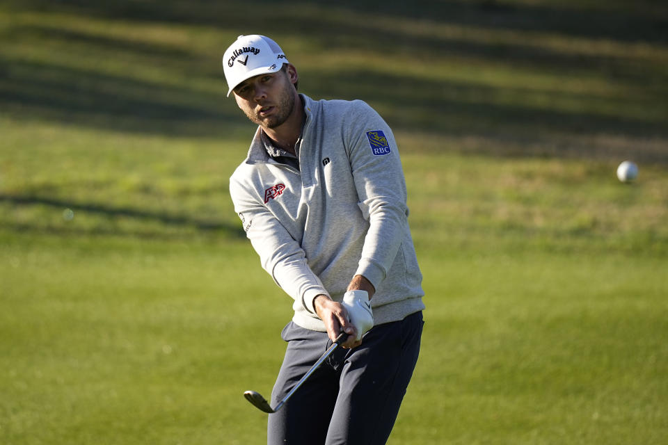 Sam Burns chips to the green on the fifth hole during a round of 16 at the Dell Technologies Match Play Championship golf tournament in Austin, Texas, Saturday, March 25, 2023. (AP Photo/Eric Gay)