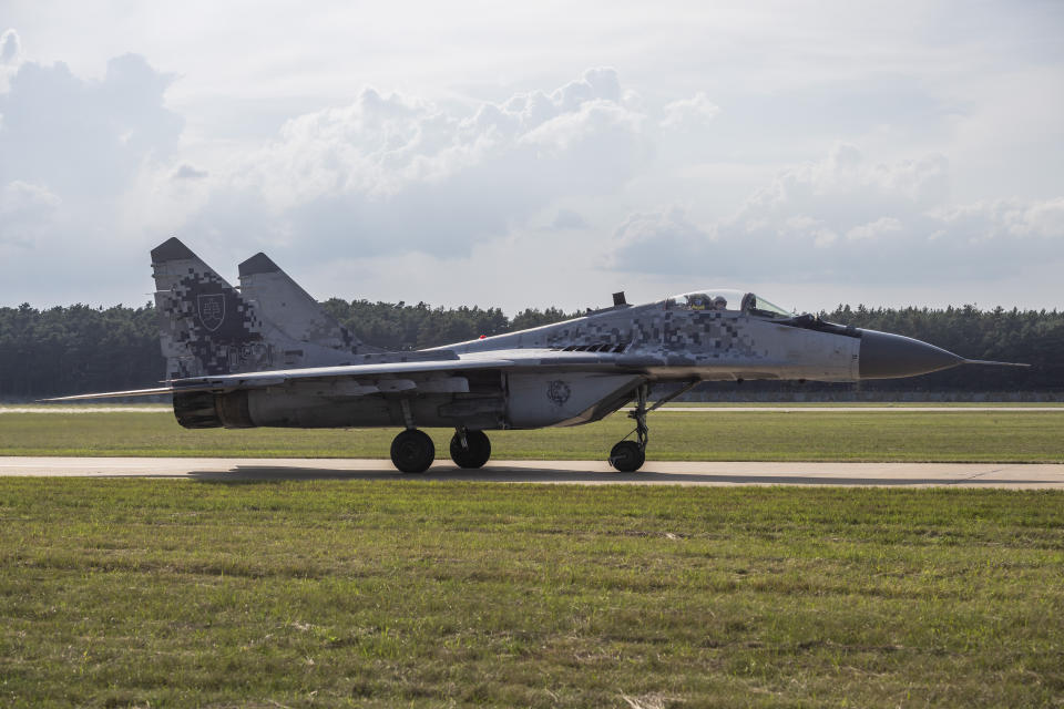 FILE - A view of a MIG-29 fighter jet, at the 11th SIAF International Aviation Day at the Malacky-Kuchyna Air Base, in Kuchyna, Slovakia, Saturday, Aug. 27, 2022. Slovakia’s government has approved a plan to give Ukraine its fleet of Soviet-era MiG-29 fighter jets. Prime Minister Eduard Heger announced the unanimous decision of his government on Friday, March 17, 2023. (Jaroslav Novak/TASR via AP, File)