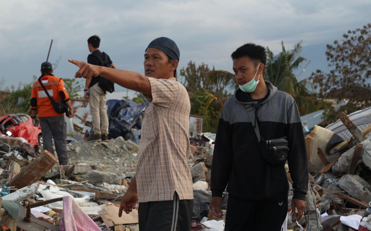 People are frantically searching for survivors - AFP