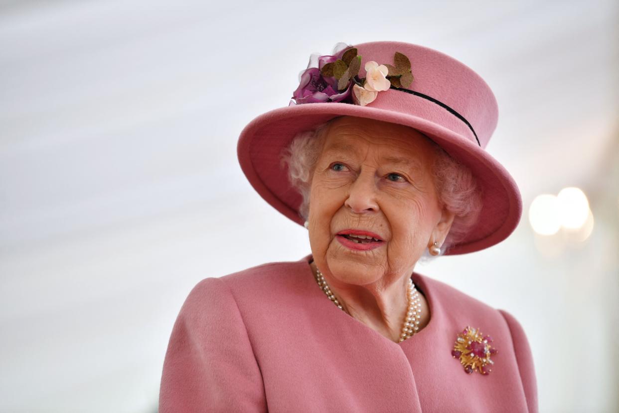 <p>AFP via Getty Images</p> (The Queen spoke to General Sir Mark Carleton-Smith on Tuesday morning)