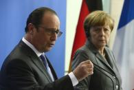 German Chancellor Angela Merkel and French President Francois Hollande want serious proposals from Greece