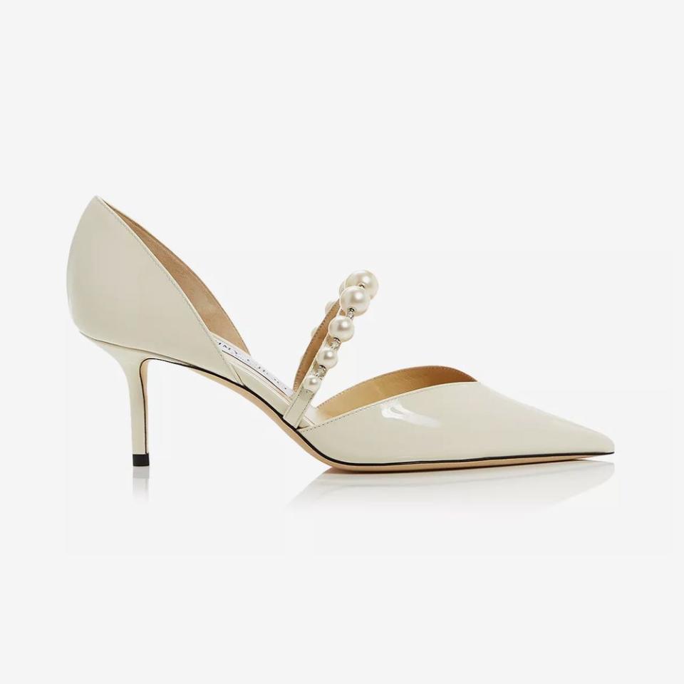 <p><a href="https://go.redirectingat.com?id=74968X1596630&url=https%3A%2F%2Fus.jimmychoo.com%2Fen%2Fwomen%2Fshoes%2Faurelie-65%2Flatte-patent-leather-pointed-pumps-with-pearl-embellishment--AURELIE65XKM081087.html%3Fgeoip%3Dgeoip%26updatePreLocale%3Dtrue%26cm_mmc%3DGoogleUS-_-Shopping-_-Shopping-_-J00014336434%26gad_source%3D1%26gclid%3DCjwKCAjw26KxBhBDEiwAu6KXt4XUtxscci6YNt0JBXx_KYU4oqO7gDPqTA8Yy3xpmFCehmFptgMVLRoCYy8QAvD_BwE%26gclsrc%3Daw.ds&sref=https%3A%2F%2Fwww.elle.com%2Ffashion%2Fshopping%2Fg39980280%2Fcomfortable-wedding-shoes%2F" rel="nofollow noopener" target="_blank" data-ylk="slk:Shop Now;elm:context_link;itc:0;sec:content-canvas" class="link ">Shop Now</a></p><p>Aurelie 65</p><p>jimmychoo.com</p><p>$995.00</p>