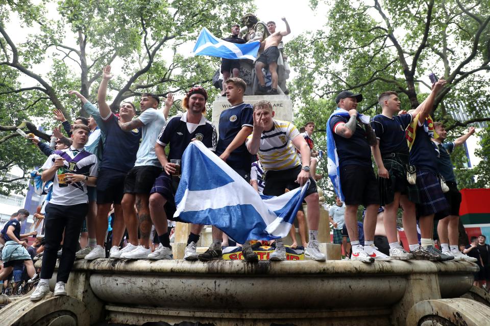 Scotland fans gather in Leicester Square before the UEFA Euro 2020 match between England and Scotland later tonight. (PA)