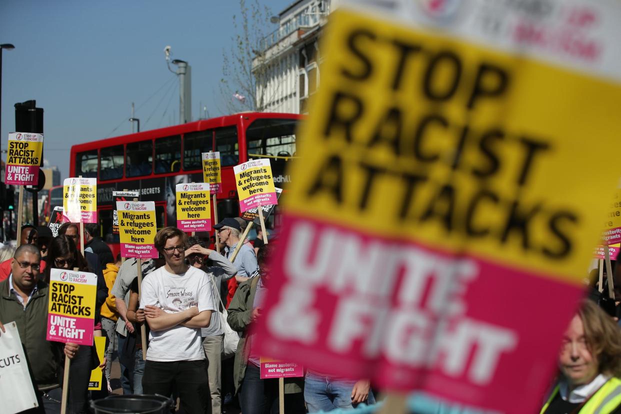 Demonstrators during a 'Stand Up To Racism' protest in Croydon following a suspected hate crime attack on a 17-year-old Kurdish Iranian asylum-seeker: AFP/Getty Images