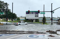 <p>A truck attempts to enter the highway in Orlando on Sept. 29.</p>