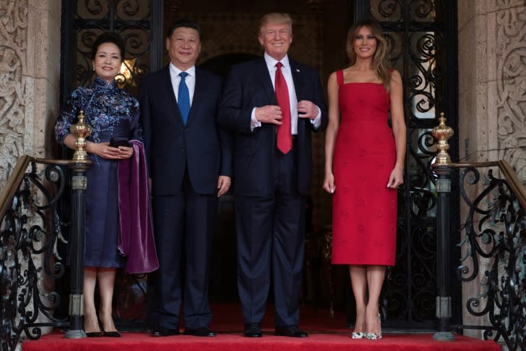 President Donald Trump and Chinese President Xi Jinping were joined by their wives Melania Trump and Peng Liyuan, a singer Trump called a "great, great celebrity"
