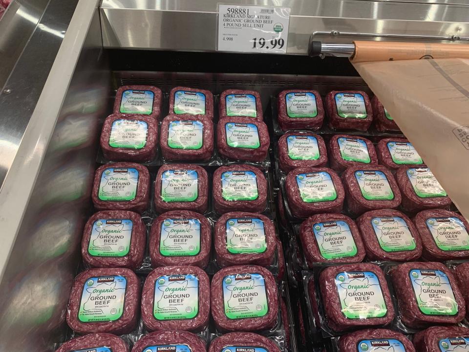 packages of ground beef in a cooler at costco