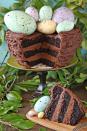 <p>If you <em>need</em> your chocolate fix, just add spring colors on top with speckled eggs.</p><p>Get the recipe from <a href="http://www.sugarhero.com/easter-nest-cake/#_a5y_p=3569981" rel="nofollow noopener" target="_blank" data-ylk="slk:Sugar Hero;elm:context_link;itc:0;sec:content-canvas" class="link ">Sugar Hero</a>.</p>