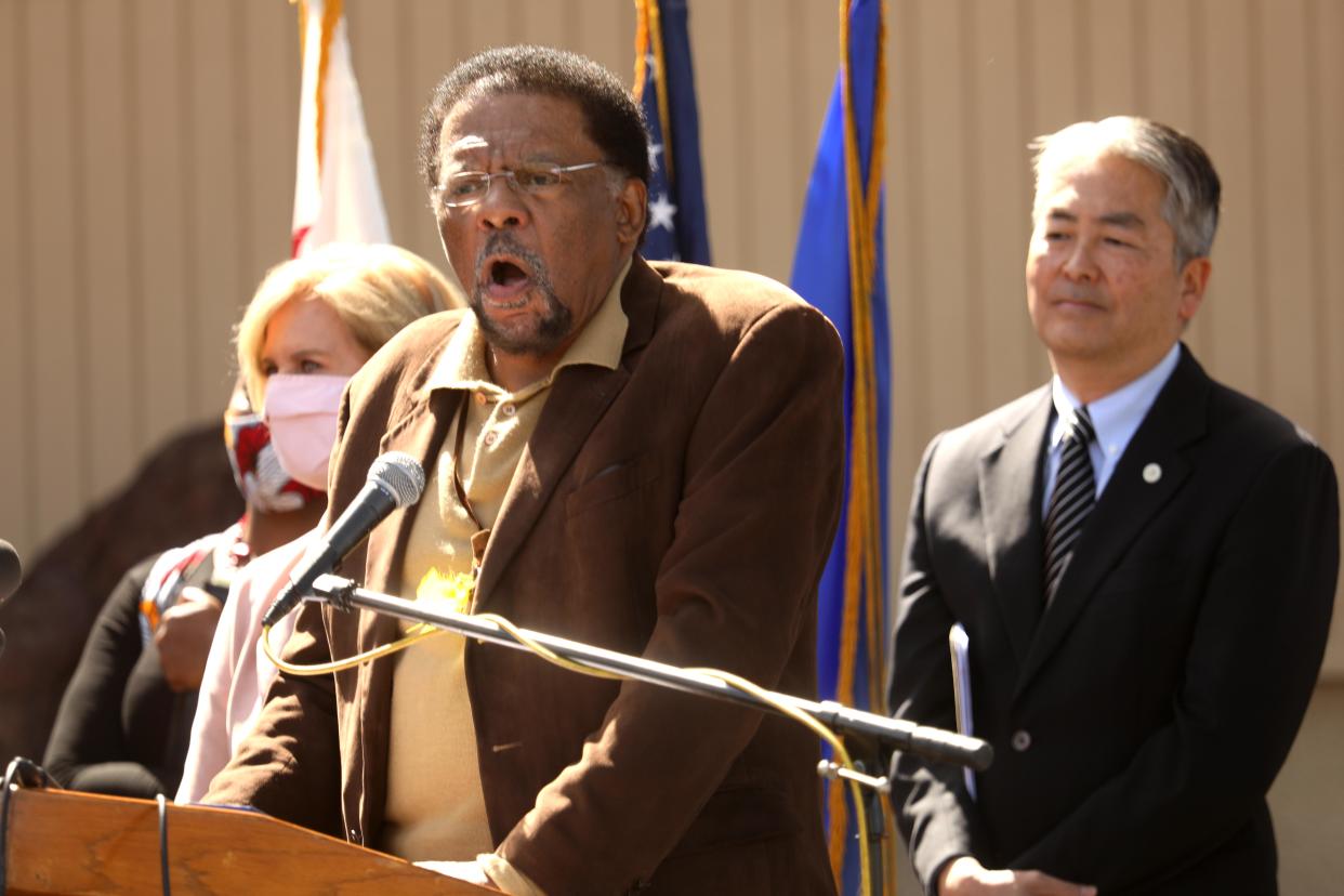 Chief Duane Yellow Feather Shepard, Sr., gives an impassioned speech in Los Angeles in April, calling for the return of the land that used to belong to his family. He is flanked by Los Angeles County Supervisor Janice Hahn, left, California Assemblyman Al Muratsuchi.