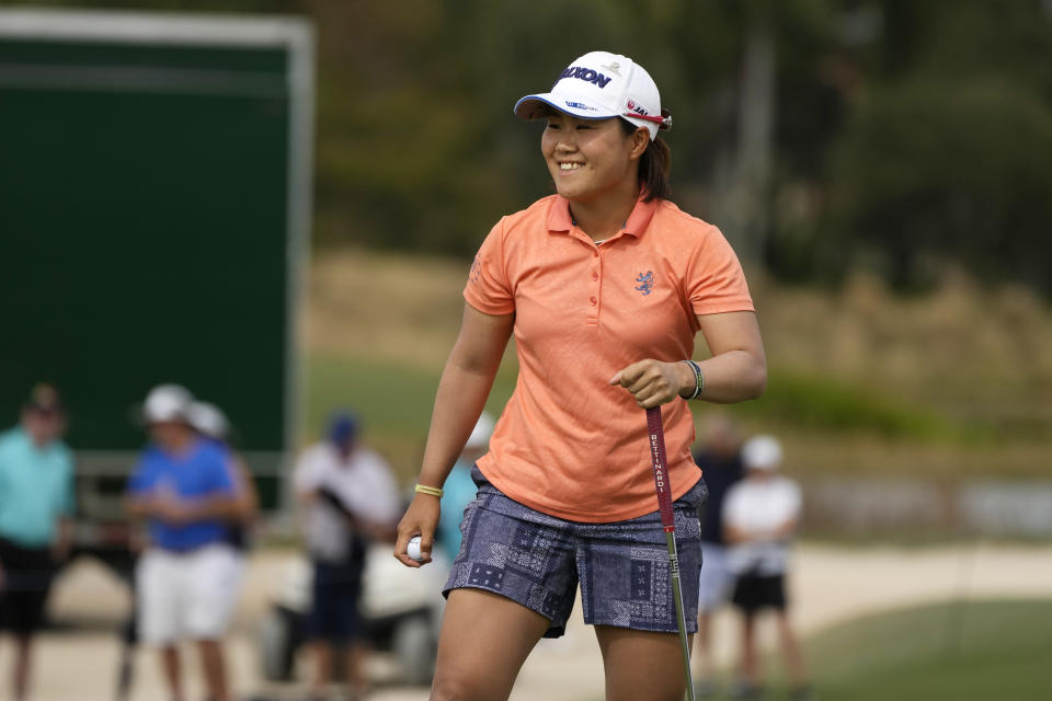 Nasa Hataoka, of Japan, smiles after a birdie on the ninth hole during the final round of the LPGA Tour Championship golf tournament, Sunday, Nov. 21, 2021, in Naples, Fla. (AP Photo/Rebecca Blackwell)