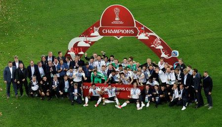 Soccer Football - Chile v Germany - FIFA Confederations Cup Russia 2017 - Final - Saint Petersburg Stadium, St. Petersburg, Russia - July 2, 2017 Germany’s players and coaches pose for photographs after winning the FIFA Confederations Cup REUTERS/Maxim Shemetov