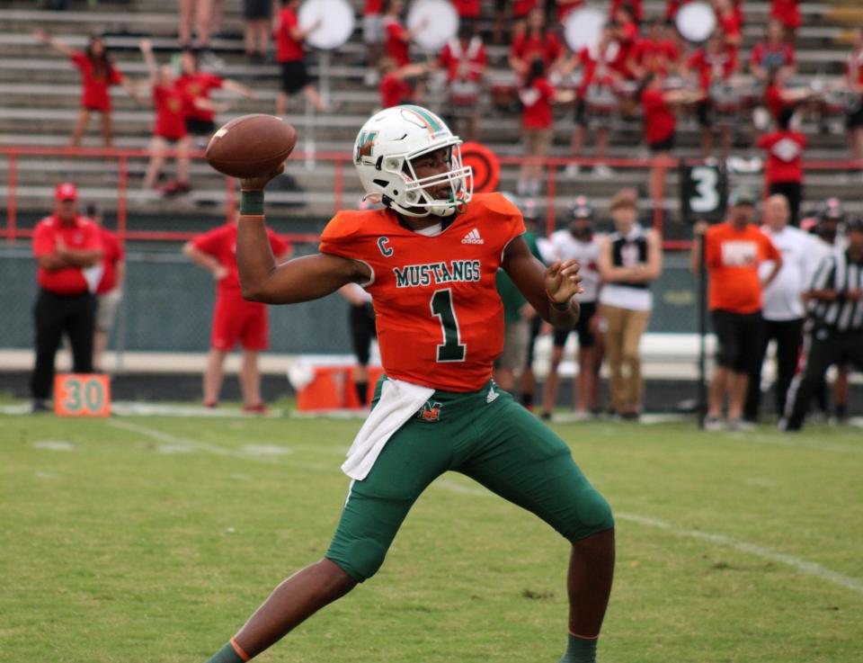 Mandarin quarterback Tramell Jones (1) launches a pass against Creekside  during a high school football game on September 23, 2022. [Clayton Freeman/Florida Times-Union]