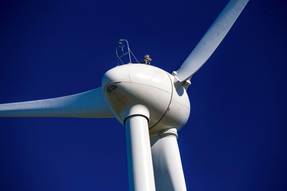 A close up of a wind turbine.